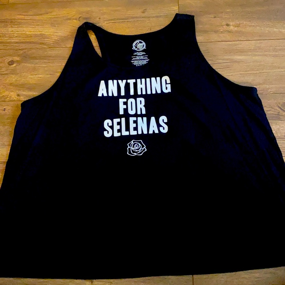 TanK top  from Torrid. Never been worn without the tags
